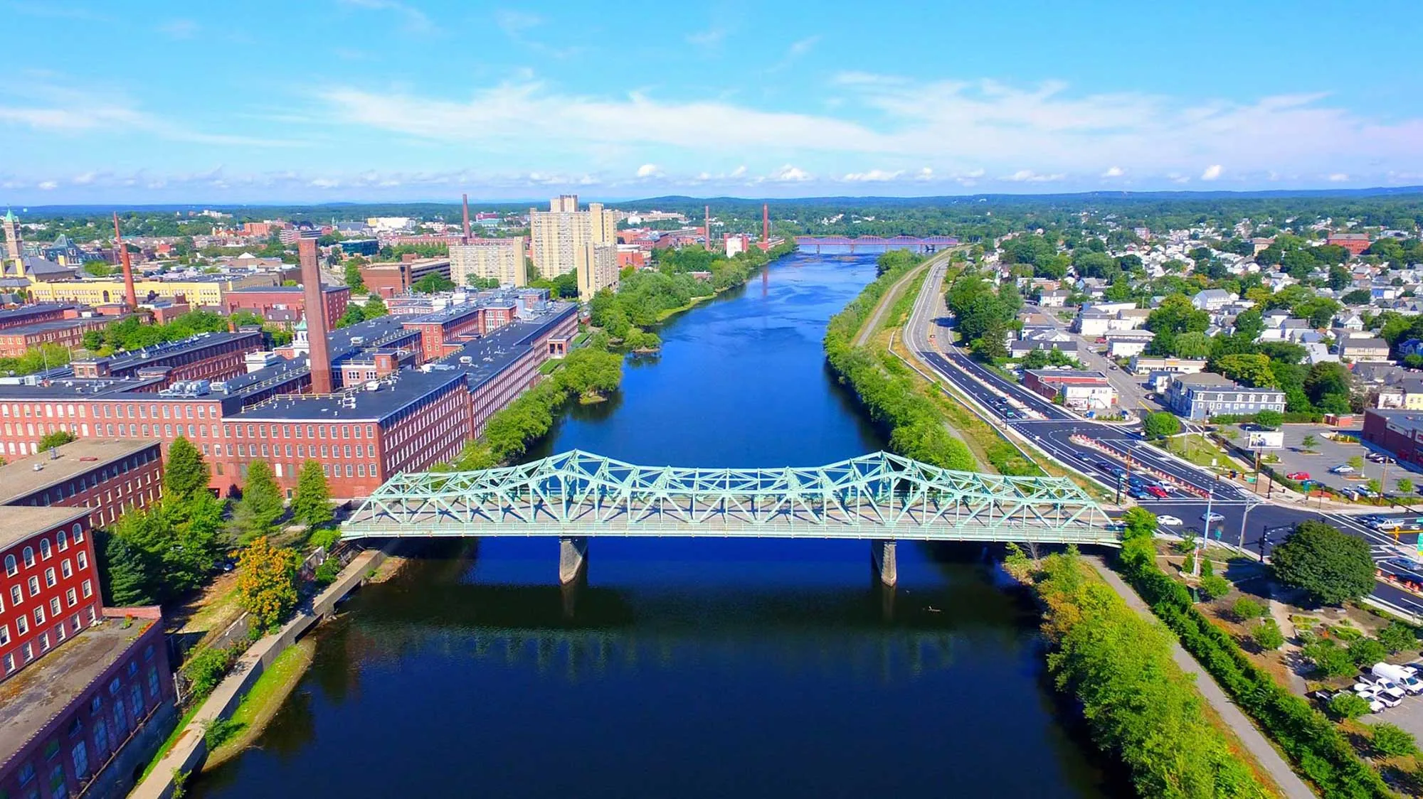 Aerial view of the Merrimack River and mill buildings in Lowell, Massachusetts