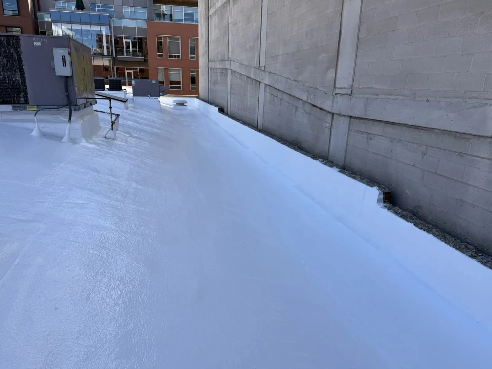 Roof Coating Restoration in Lowell, MA